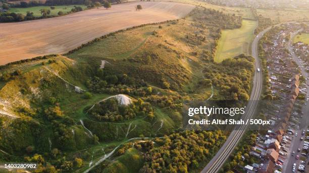 aerial view of british motorways,m1 j11a at luton and british countryside,dunstable,united kingdom,uk - dunstable stock-fotos und bilder