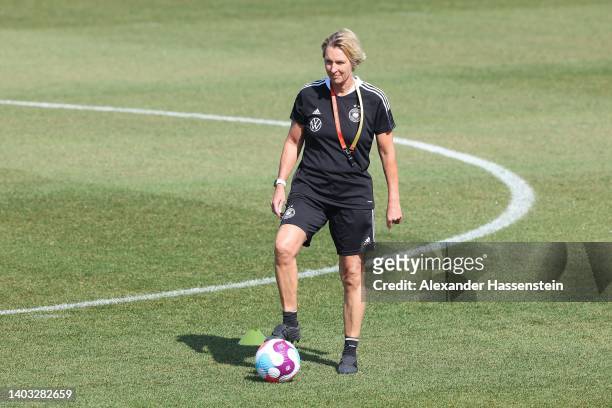 Martina Voss-Tecklenburg, head coach of Germany looks on during a trainig session of the German Women's national soccer team during the media day of...