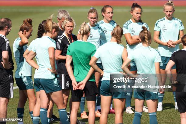 Martina Voss-Tecklenburg, head coach of Germany talks to the team during a training session of the German Women's national soccer team during the...