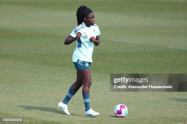 Nicole Anyomi of Germany runs with the ball during a training session of the German Women's national soccer team during the media day of the German...