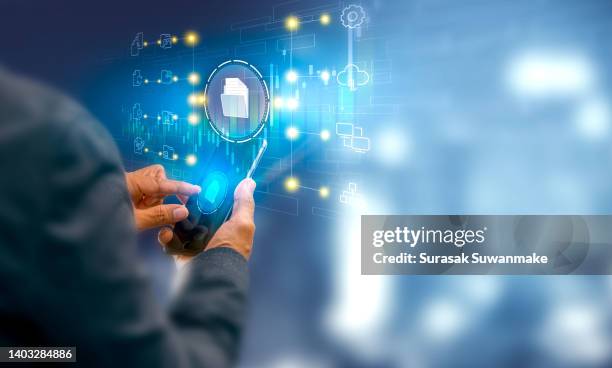 businessman using computer technology for document management online document database and digital file storage systems or software record keeping document sharing - matrix organisation stock pictures, royalty-free photos & images