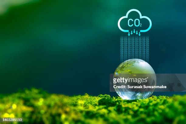sustainable business with the planet through renewable energy and green co2 emissions, whereby using renewable energy can limit climate change and global warming. - carbon dioxide stock pictures, royalty-free photos & images