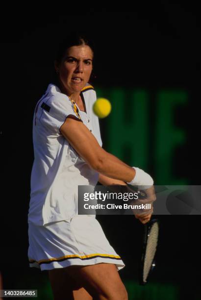 Jennifer Capriati from the United States plays a double handed forehand return against Magdalena Grzybowska of Poland during their Women's Singles...