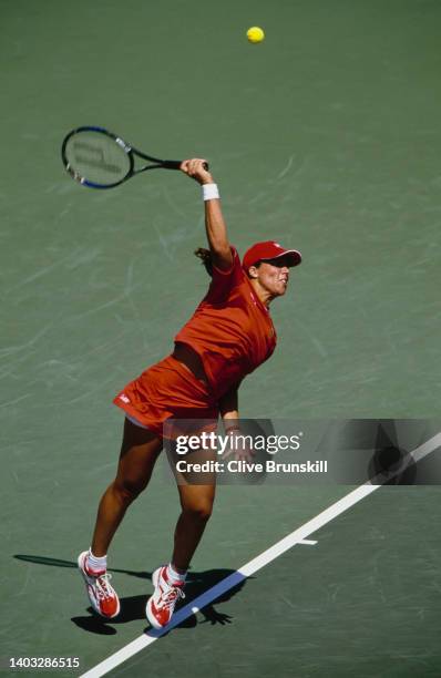 Jennifer Capriati from the United States reaches to serve to Eleni Daniilidou of Greece during their Women's Singles Second Round match at the 2002...