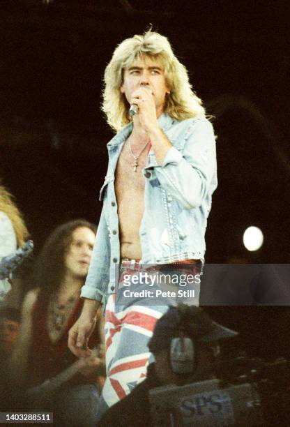 Joe Elliott of Def Leppard performs on stage wearing Union Jack trousers at The Freddie Mercury Tribute concert at Wembley Stadium, on April 20th,...