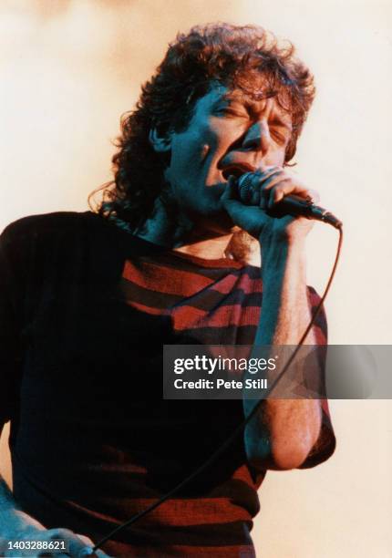 English singer Robert Plant of rock band Led Zeppelin performs on stage on his solo tour, 'The Principle of Moments', at Hammersmith Odeon on...