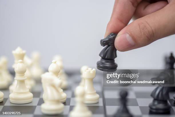 playing chess, leader & success concept. - chess king piece stock pictures, royalty-free photos & images