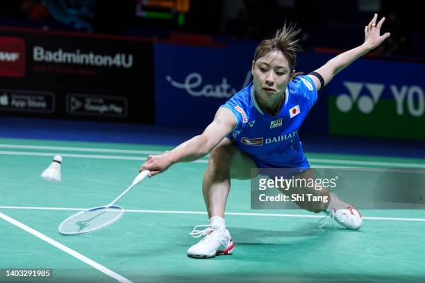 Nozomi Okuhara of Japan competes in the Women's Singles Second Round match against Phittayaporn Chaiwan of Thailand on day three of the Indonesia...
