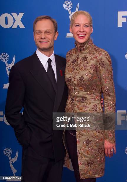 Emmy Winner David Hyde Pierce with Jenna Elfman backstage at the 52nd Emmy Awards Show at the Shrine Auditorium, September 12, 1999 in Los Angeles,...