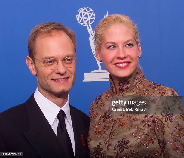 Emmy Winner David Hyde Pierce with Jenna Elfman backstage at the 52nd Emmy Awards Show at the Shrine Auditorium, September 12, 1999 in Los Angeles,...