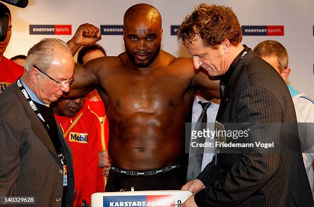 Jean-Marc Mormeck of France poses during the weigh in for the IBO, WBO, WBA and IBF heavy weight title fight against Wladimir Klitschko of Ukraine at...