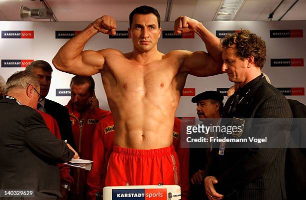 Wladimir Klitschko of Ukraine poses during the weigh in for the IBO, WBO, WBA and IBF heavy weight title fight against Jean-Marc Mormeck of France at...