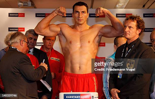 Wladimir Klitschko of Ukraine poses during the weigh in for the IBO, WBO, WBA and IBF heavy weight title fight against Jean-Marc Mormeck of France at...