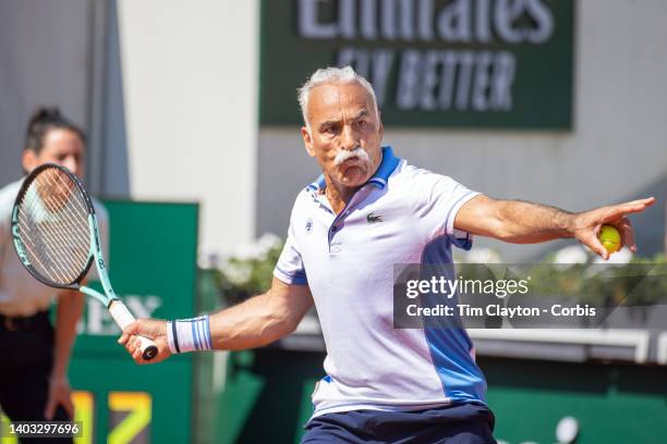 Mansour Bahrami of France playing in the Men's Legends Doubles match on Court Suzanne Lenglen at the 2022 French Open Tennis Tournament at Roland...
