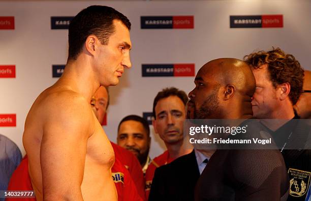 Wladimir Klitschko of Ukraine and Jean-Marc Mormeck of France come face to face during the weigh in for their IBO, WBO, WBA and IBF heavy weight...