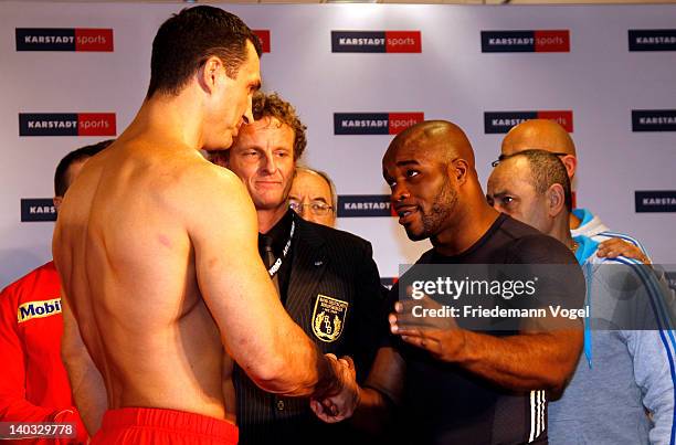 Wladimir Klitschko of Ukraine and Jean-Marc Mormeck of France come face to face during the weigh in for their IBO, WBO, WBA and IBF heavy weight...