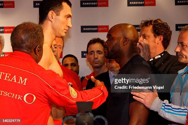 Wladimir Klitschko of Ukraine and Jean-Marc Mormeck of France come face to face during the weigh in for their IBO, WBO, WBA and IBF heavy weight...