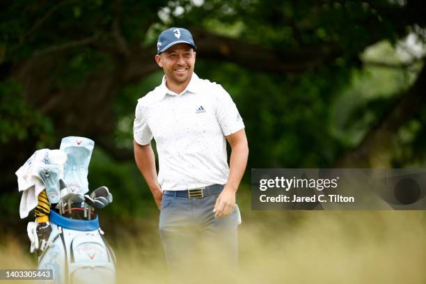 Xander Schauffele of the United States smiles on the sixth tee during round one of the 122nd U.S. Open Championship at The Country Club on June 16,...