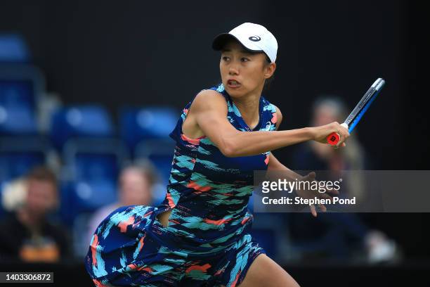 Shuai Zhang of China plays a forehand against Elena-Gabriela Ruse of Romania during the singles round of 16 match on Day Six of the Rothesay Classic...
