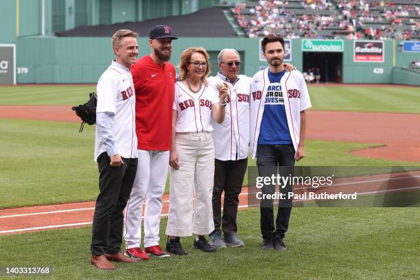Congresswoman Gabriel Giffords and March for Our Lives founder David Hogg and John Rosenthal pose with John Schrieder of the Boston Red Sox before a...