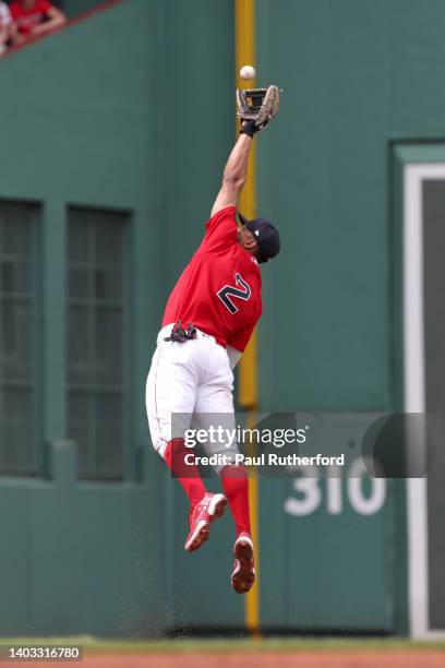 Xander Bogaerts of the Boston Red Sox catches a pop fly during the third inning against the Oakland Athletics at Fenway Park on June 16, 2022 in...
