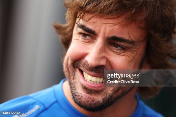 Fernando Alonso of Spain and Alpine F1 looks on in the Paddock during previews ahead of the F1 Grand Prix of Canada at Circuit Gilles Villeneuve on...