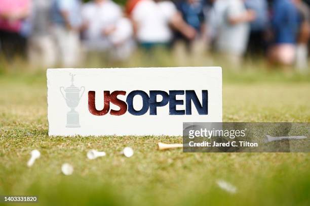 Tee marker on the ninth hole is seen during round one of the 122nd U.S. Open Championship at The Country Club on June 16, 2022 in Brookline,...