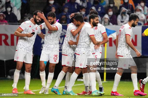 Ferjani Sassi of Tunisia celebrates scoring his side's second goal during the international friendly match between Japan and Tunisia at Panasonic...