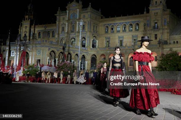 Model parades a dress from the Cruise 2023 collection of French fashion house Dior at the Plaza de España, on June 16 in Seville .