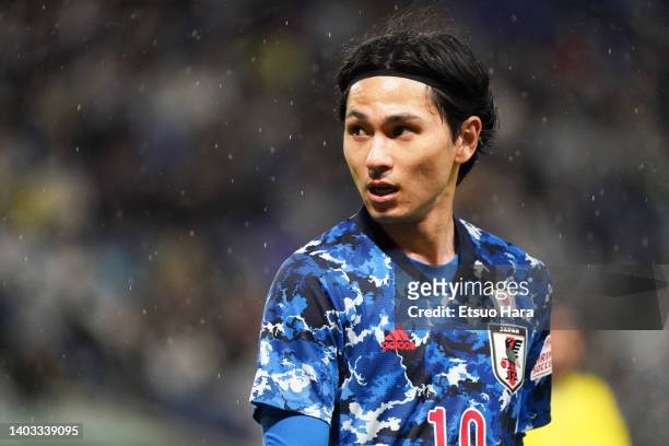 Takumi Minamino of Japan reacts during the international friendly match between Japan and Tunisia at Panasonic Stadium Suita on June 14, 2022 in...