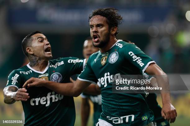 Gustavo Scarpa of Palmeiras celebrates with teammate Dudu after scoring the third goal of his team during the match between Palmeiras and Atletico...
