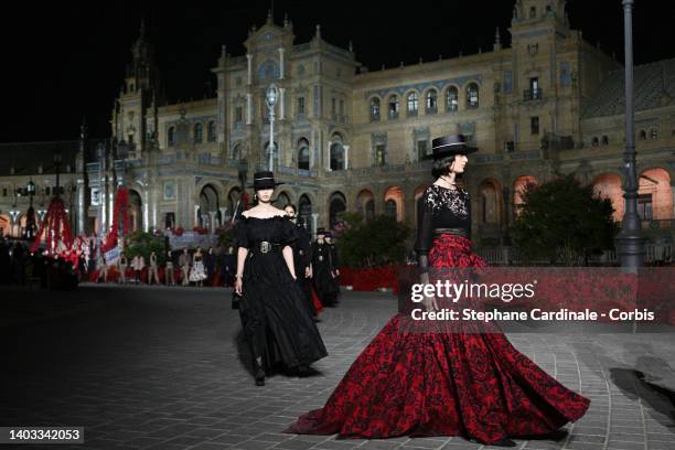 Models walk the runway during the Dior "Crucero Collection" fashion show by Christian Dior at Plaza de España on June 16, 2022 in Seville, Spain.