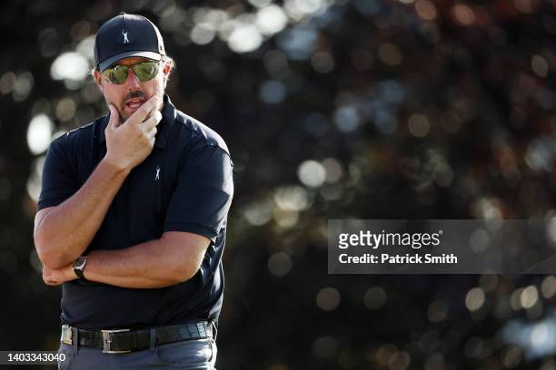 Phil Mickelson of the United States waits on the 16th tee during round one of the 122nd U.S. Open Championship at The Country Club on June 16, 2022...