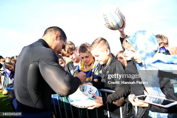 Aaron Smith signs autographs following a New Zealand All Blacks training session at Blake Park on June 17, 2022 in Mount Maunganui, New Zealand.