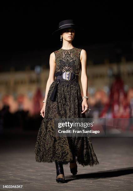 Model walks the runway during the Dior "Crucero Collection" fashion show by Christian Dior at Plaza de España on June 16, 2022 in Seville, Spain.