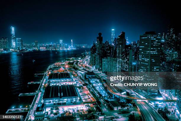 night view of hong kong urban area - electrical overload stockfoto's en -beelden