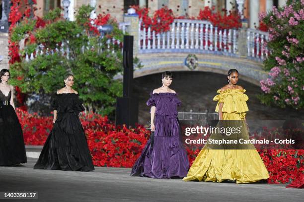 Models walk the runway during the Dior "Crucero Collection" fashion show by Christian Dior at Plaza de España on June 16, 2022 in Seville, Spain.