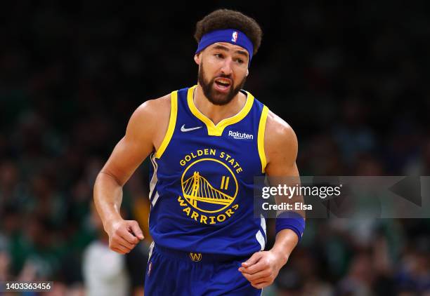 Klay Thompson of the Golden State Warriors celebrates a three pointer against the Boston Celtics during the first quarter in Game Six of the 2022 NBA...