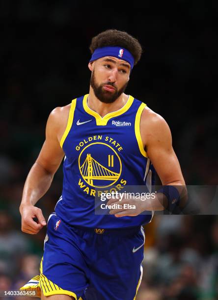 Klay Thompson of the Golden State Warriors celebrates a three pointer against the Boston Celtics during the first quarter in Game Six of the 2022 NBA...