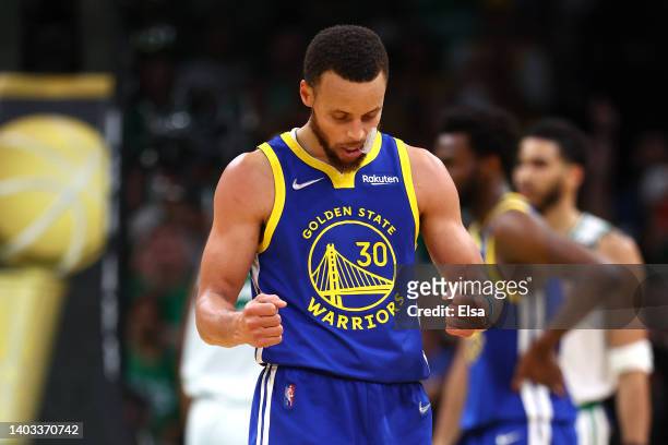 Stephen Curry of the Golden State Warriors celebrates against the Boston Celtics during the third quarter in Game Six of the 2022 NBA Finals at TD...