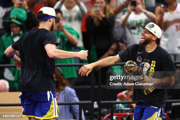 Stephen Curry and Klay Thompson of the Golden State Warriors celebrate after defeating the Boston Celtics 103-90 in Game Six of the 2022 NBA Finals...