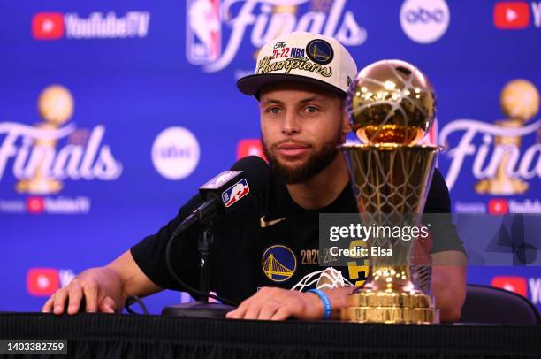 Stephen Curry of the Golden State Warriors speaks to the media after defeating the Boston Celtics 103-90 in Game Six to win the 2022 NBA Finals at TD...
