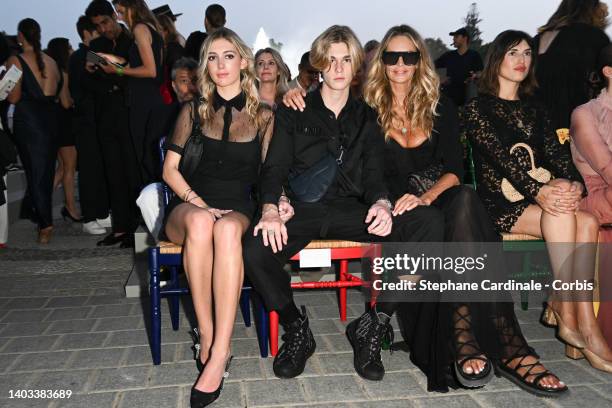 Elle Macpherson and son Cy Busson and a guest attend "Crucero Collection" fashion show presentation by Dior at Plaza de España on June 16, 2022 in...