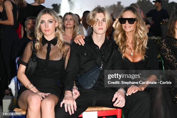 Elle Macpherson and son Cy Busson and a guest attend "Crucero Collection" fashion show presentation by Dior at Plaza de España on June 16, 2022 in...