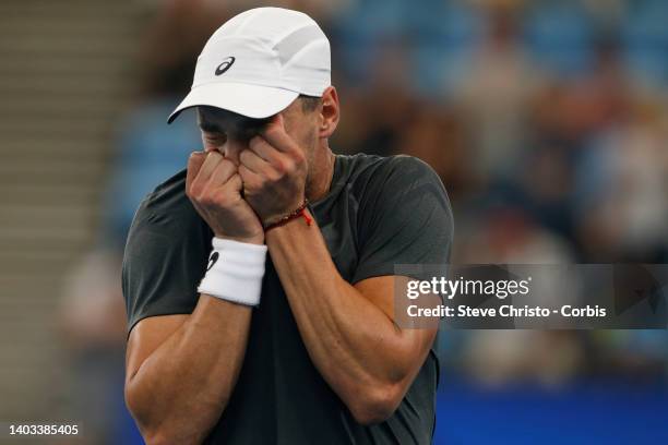 Dimitar Kuzmanov of Bulgaria reacts to winning the match against Alexander Cozbinov of Moldova during day three of the 2020 ATP Cup at Ken Rosewall...
