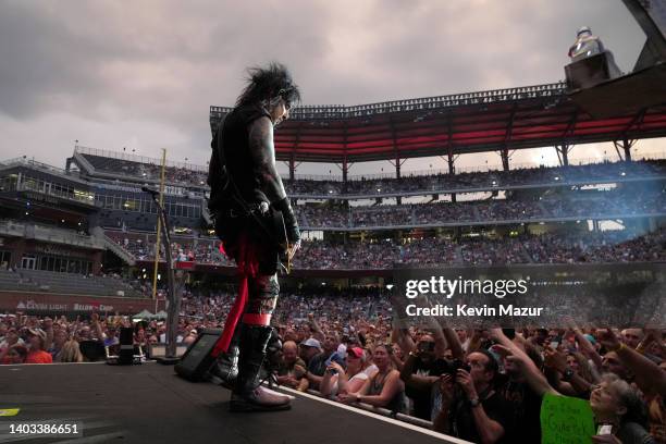 Nikki Sixx of Mötley Crüe performs onstage during The Stadium Tour at Truist Park on June 16, 2022 in Atlanta, Georgia.