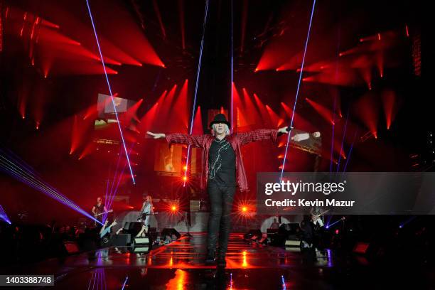 Vivian Campbell, Rick Savage, Joe Elliott, and Phil Collen of Def Leppard perform onstage during The Stadium Tour at Truist Park on June 16, 2022 in...