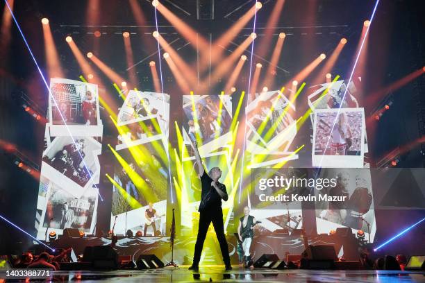 Vivian Campbell, Rick Savage, Joe Elliott, and Phil Collen of Def Leppard perform onstage during The Stadium Tour at Truist Park on June 16, 2022 in...