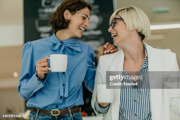 coffee brake at work and two of us - coffee machine stock pictures, royalty-free photos & images