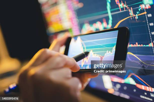 uncertainly in recession inflation - fake stock trading stock pictures, royalty-free photos & images